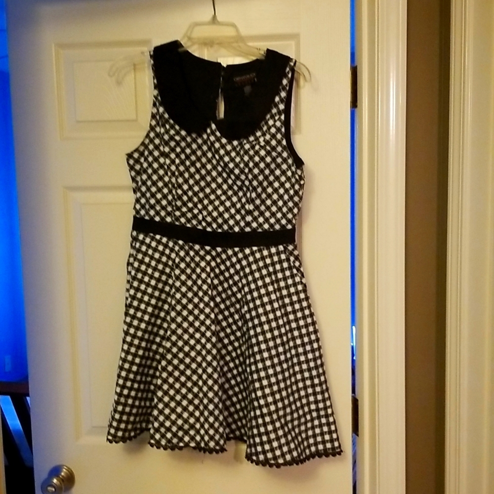 Dress with tiny gun detail